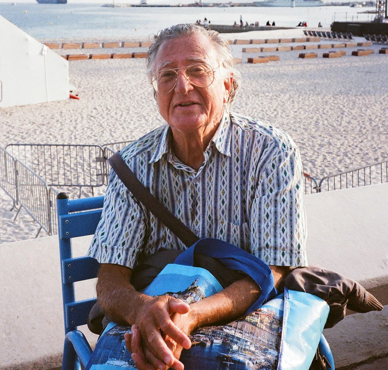 A senior man relaxing at the beach